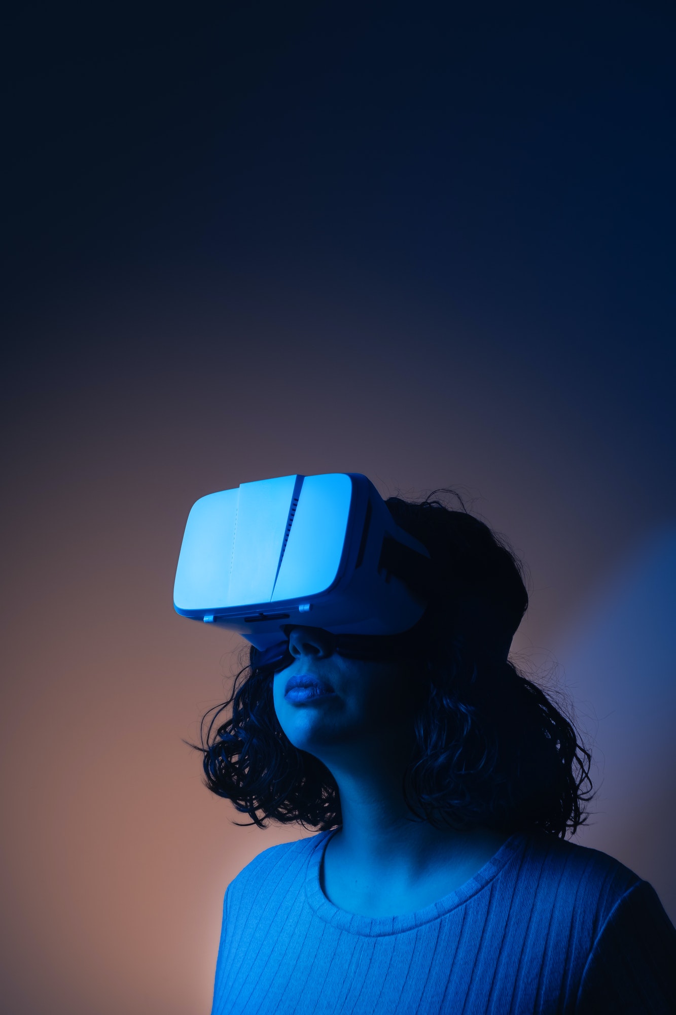 young woman with virtual reality glasses